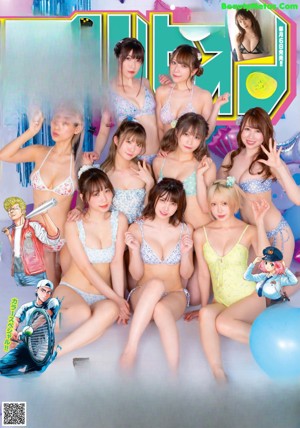 A group of young women in bikinis posing for a picture.